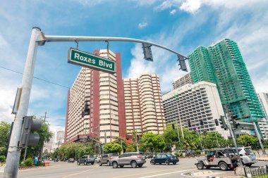 Manila, Philippines - June 2020: A sign of Roxas Boulevard. Intersection of Roxas Blvd and Ocampo Street. clipart
