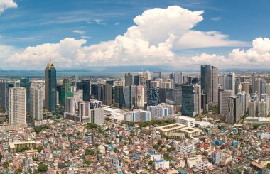 Bonifacio Global City, Metro Manila, Filipinler BGC siluetinin bir parçası. Öndeki komşu Makati 'nin binalarını küçültmek için yoğunlaşın.