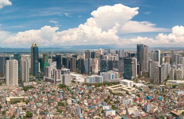 Bonifacio Global City, Metro Manila, Philippines - Part of the BGC skyline. Dense low to midrise buildings of neighboring Makati in front. clipart
