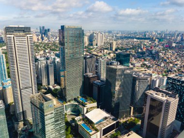 Bonifacio Global City, Taguig, Metro Manila Fort Bonifacio 'nun batı kesiminin manzarası. 200 metreden insansız hava aracı ile görüldü. Makati ufuk çizgisi arkasında kısmen görünür.