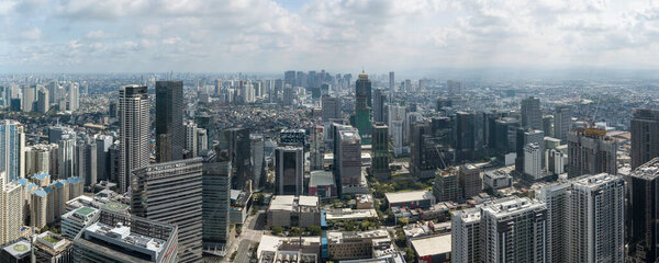 Bonifacio Global City, Taguig, Metro Manila - Panoramic aerial of Fort Bonifacio skyline. Makati skyline visible at the back.