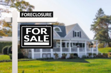 Black Foreclosure Home For Sale Real Estate Sign in front of an American style house. clipart