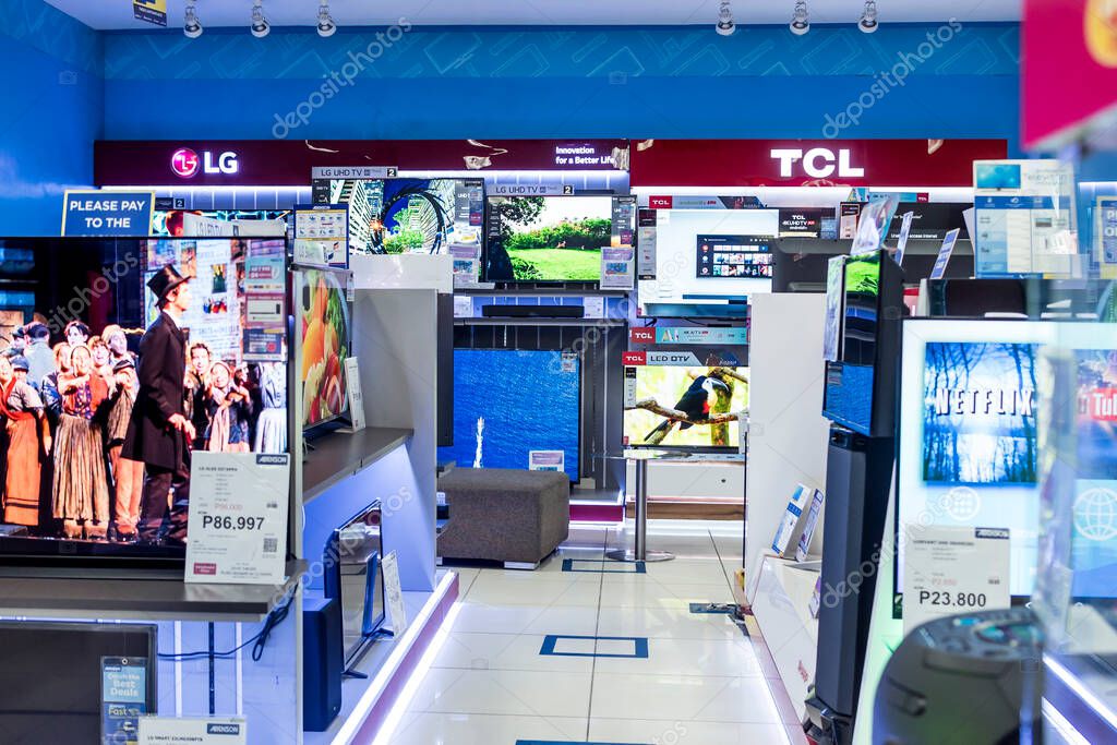 Manila, Philippines - Sept 2020: TVs of various sizes and brands for sale at an appliance store.