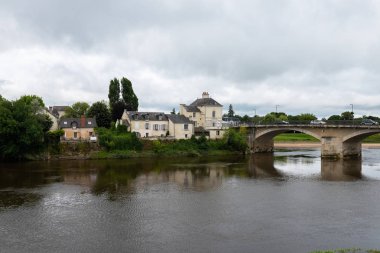 View of Chinon and the bridge over the Vienne River from the northern bank, France clipart