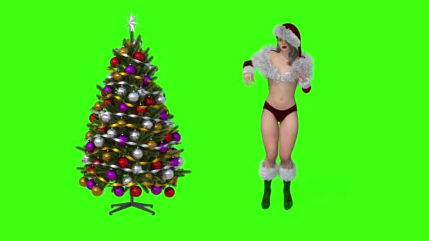 Санта танцует возле новогодней елки — стоковое видео