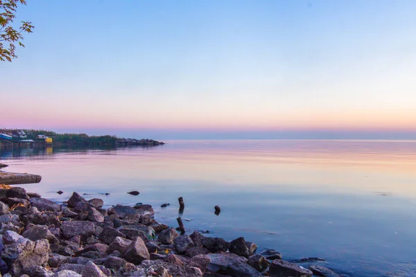 landscape on the water - sunset on the coast (horizon). top view.