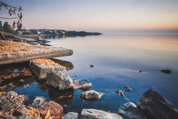 landscape on the water - sunset on the coast (horizon). top view.