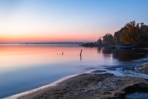 landscape on the water - sunset on the coast (horizon). top view.