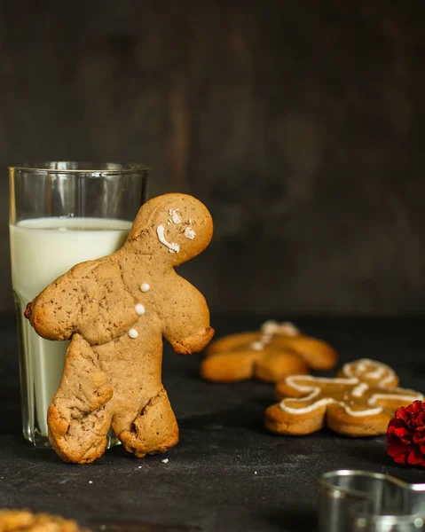 gingerbread man - handmade baking (dessert cookies). happy new year. food background