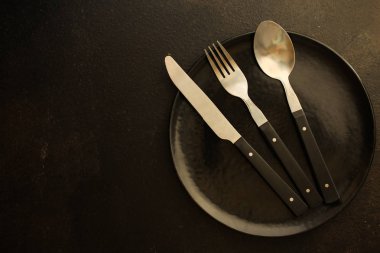 çatal bıçak, yemek veya hizmet (çatal, bıçak, kaşık - set) için kullanılır. gıda arka plan. kopyalama alanı