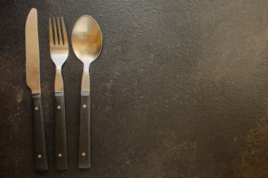 çatal bıçak, yemek veya hizmet (çatal, bıçak, kaşık - set) için kullanılır. gıda arka plan. kopyalama alanı