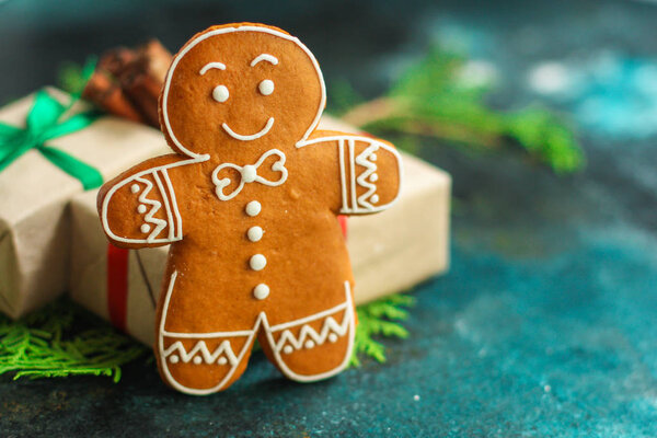 Пряничные пряники. подарки и праздник, с Новым годом. праздничный фон. пищевой фон. вид сверху. копировальное пространство
