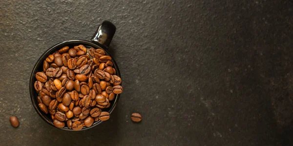 coffee drink and sprinkle coffee beans on the table. food background. top. copy space