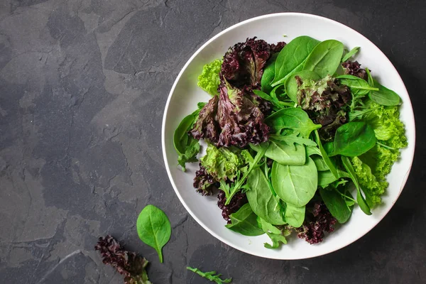 Healthy salad, leaves mix salad (mix micro greens, juicy snack). food background - Image