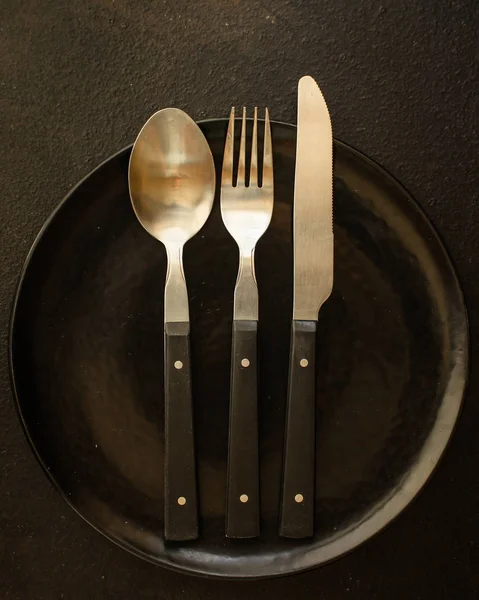 Cutleryrustic, used for eating or serving (fork, knife, spoon - set). food background. copy space — Stock Image Cutleryrustic Used Eating Serving Fork Knife Spoon Set Food Background Royalty Free Stock Images