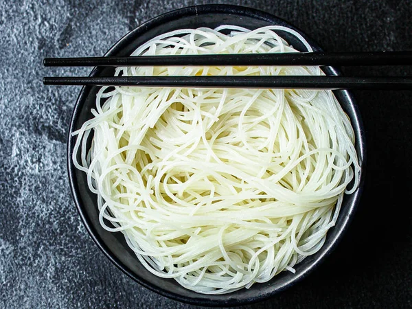 rice noodles thin portion glass noodle Menu serving size. asian food background top view copy space