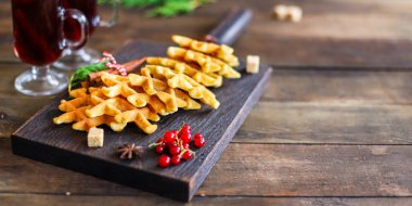 Waffle 'lar tatlı tatlı yeni yıl, yeni yıl menü servis etme boyutunda. yemek arkaplan görünümü metin sağlıklı yeme için kopyalama alanı