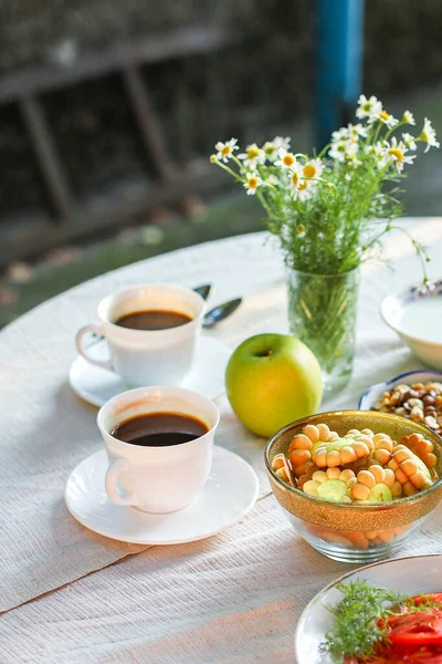 coffee and breakfast on the table outdoor tea party, coffee break outdoor food background top view copy space for text organic healthy eating