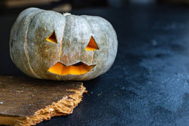 Cadılar Bayramı için balkabağı süslemesi Cadılar Bayramı, masada yemek lezzeti porsiyon porsiyon porsiyon üst görünüm fotokopi alanı metin yiyecekleri arka planı kırsal