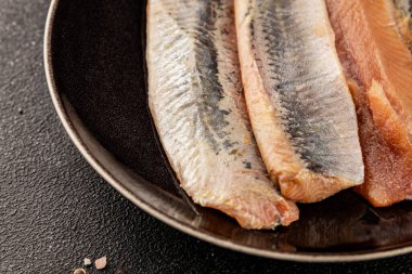 Ringa fileto balığı taze deniz ürünleri porsiyon doğal ürün lezzetli çerez lezzetli gurme yemek arkaplan masa üzerinde rustik üst görünüm fotokopi alanı pesseeter diyet