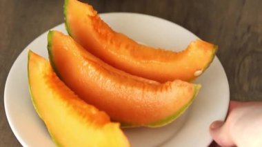 Kavunlu Charente, olgun, tatlı, tatlı, tatlı, lezzetli, lezzetli gurme yemek arka planda, sofrada. Kırsal yemekler, fotokopi alanı Keto ve paleo diyeti vegan ve vejetaryen yemekleri.