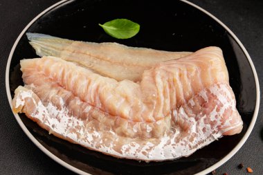 Fileto morina balığı deniz mahsulleri yaygın ling doğal ürün lezzetli aperatif lezzetli lezzetli gurme yemek arkaplan masa üzerinde rustik üst görünüm fotokopi alanı pesseeter diyet