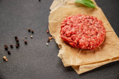 Raw cutlet meat burger ground meat beef, pork fresh natural product tasty snack delicious gourmet food background on the table rustic top view copy space