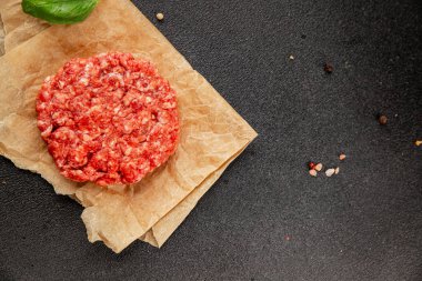 Raw cutlet meat burger ground meat beef, pork fresh natural product tasty snack delicious gourmet food background on the table rustic top view copy space