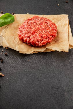 Raw cutlet meat burger ground meat beef, pork fresh natural product tasty snack delicious gourmet food background on the table rustic top view copy space
