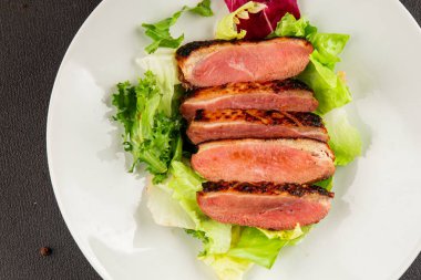 Duck breast roast poultry fresh natural product tasty snack delicious gourmet food background on the table rustic top view copy space
