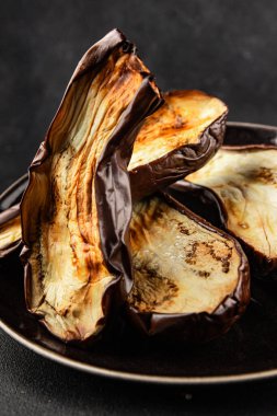 Baked eggplant grilled vegetables fresh natural product tasty snack delicious gourmet food background on the table rustic top view copy space keto and paleo diet vegan and vegan food