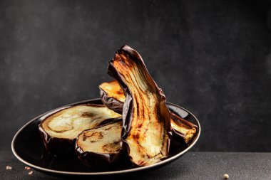 Baked eggplant grilled vegetables fresh natural product tasty snack delicious gourmet food background on the table rustic top view copy space keto and paleo diet vegan and vegan food