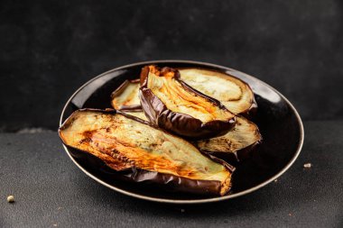 Baked eggplant grilled vegetables fresh natural product tasty snack delicious gourmet food background on the table rustic top view copy space keto and paleo diet vegan and vegan food