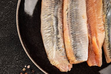 Ringa fileto balığı taze deniz ürünleri porsiyon doğal ürün lezzetli çerez lezzetli gurme yemek arkaplan masa üzerinde rustik üst görünüm fotokopi alanı pesseeter diyet