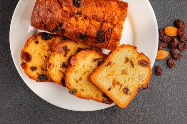 Meyveli kek tatlı meyveli pasta kurutulmuş meyveler, fındıklı geleneksel pişmiş yiyecekler doğal ürünler lezzetli çerezler lezzetli gurme yemek arkaplan masanın kırsal kesiminde fotokopi alanı