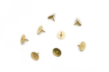 Small Collection Of 4 Brass Thumbtacks On White Background clipart