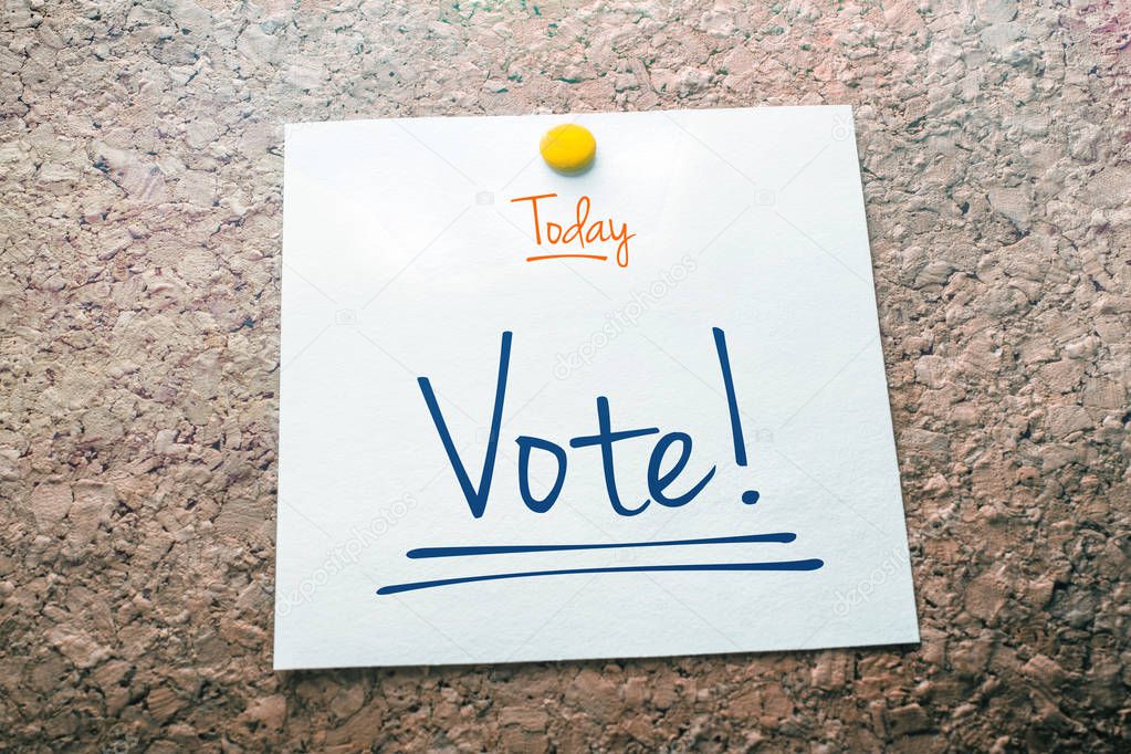 Vote Reminder For Today On Paper Pinned On Cork Board