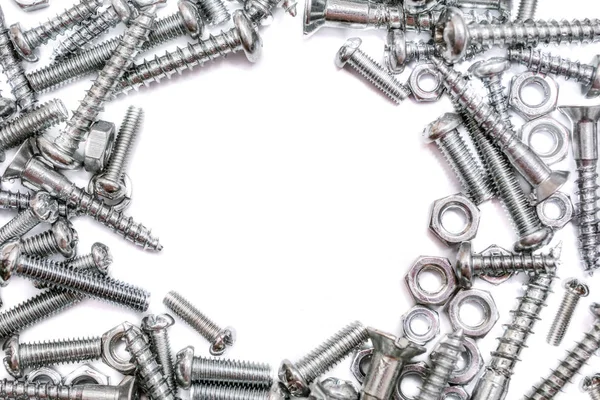 Big Collection Of Iron Screws, Wood Screws and Bolts With A Free Circle For Text In The Middle — Stock Photo, Image