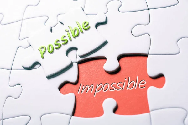 The Words Possible And Impossible In Missing Piece Jigsaw Puzzle — Stock Photo, Image