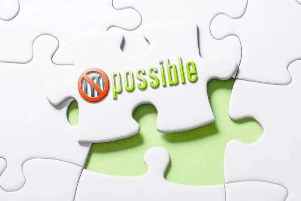 The Word Impossible With Crossed Out IM In Missing Piece Jigsaw Puzzle — Stock Photo, Image