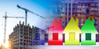 Construction of a new house on the background of the urban landscape . The concept of urban construction . clipart
