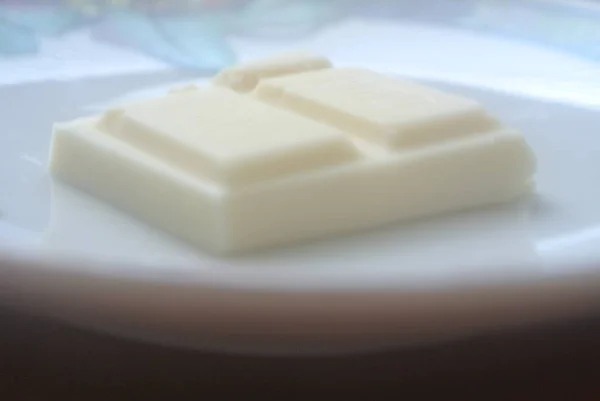 Nahaufnahme Eines Stücks Weißer Schokolade — Stockfoto
