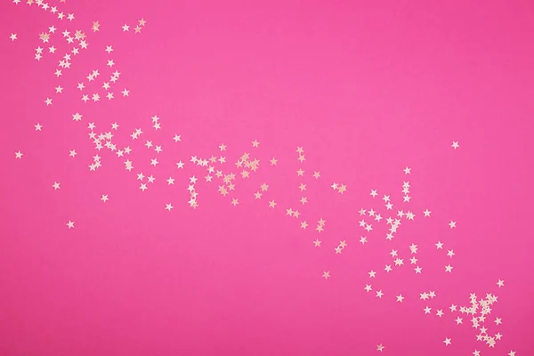 부드러운 핑크 컬러 배경 작은 blazing 스타와 함께입니다. 축제 프로젝트에 대 한 화려한 배경입니다. 수평, 복사 공간, — 스톡 사진