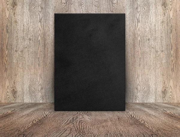 Blank Black Canvas Poster Leaning Wood Wall Wooden Floor Perspective — Stock Photo, Image