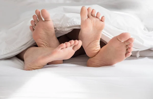 Close Barefoot Legs Lesbian Couple Lovers Sleep White Bed Bedroom — Stock Photo, Image