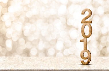 Mutlu yeni yıl 2019 ahşap altın bokeh arka plan ile mermer masa, tatil bayram kutlama concept.copy alanı görüntülemek için bir metin veya içerik parlayan yıldızı
