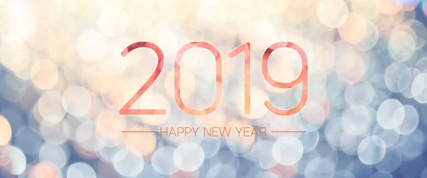 Happy new year 2019 banner with pale yellow and blue bokeh light sparkling background,Holiday greeting card