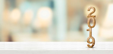 Mutlu yeni yıl 2019 soluk yumuşak bokeh duvar, mermer masada görüntü veya tatil promosyon için ürünün montaj için afiş ve çevrimiçi içerik için reklam.