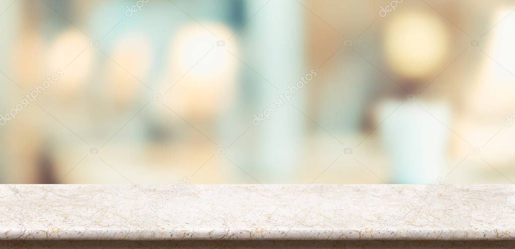 Empty glossy marble table and blurred soft light table in restaurant with bokeh background. product display template.Business presentation