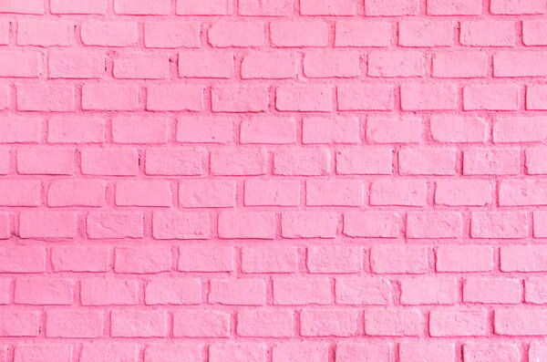 Pastel pink ordered brick wall texture background, backdrop for l
